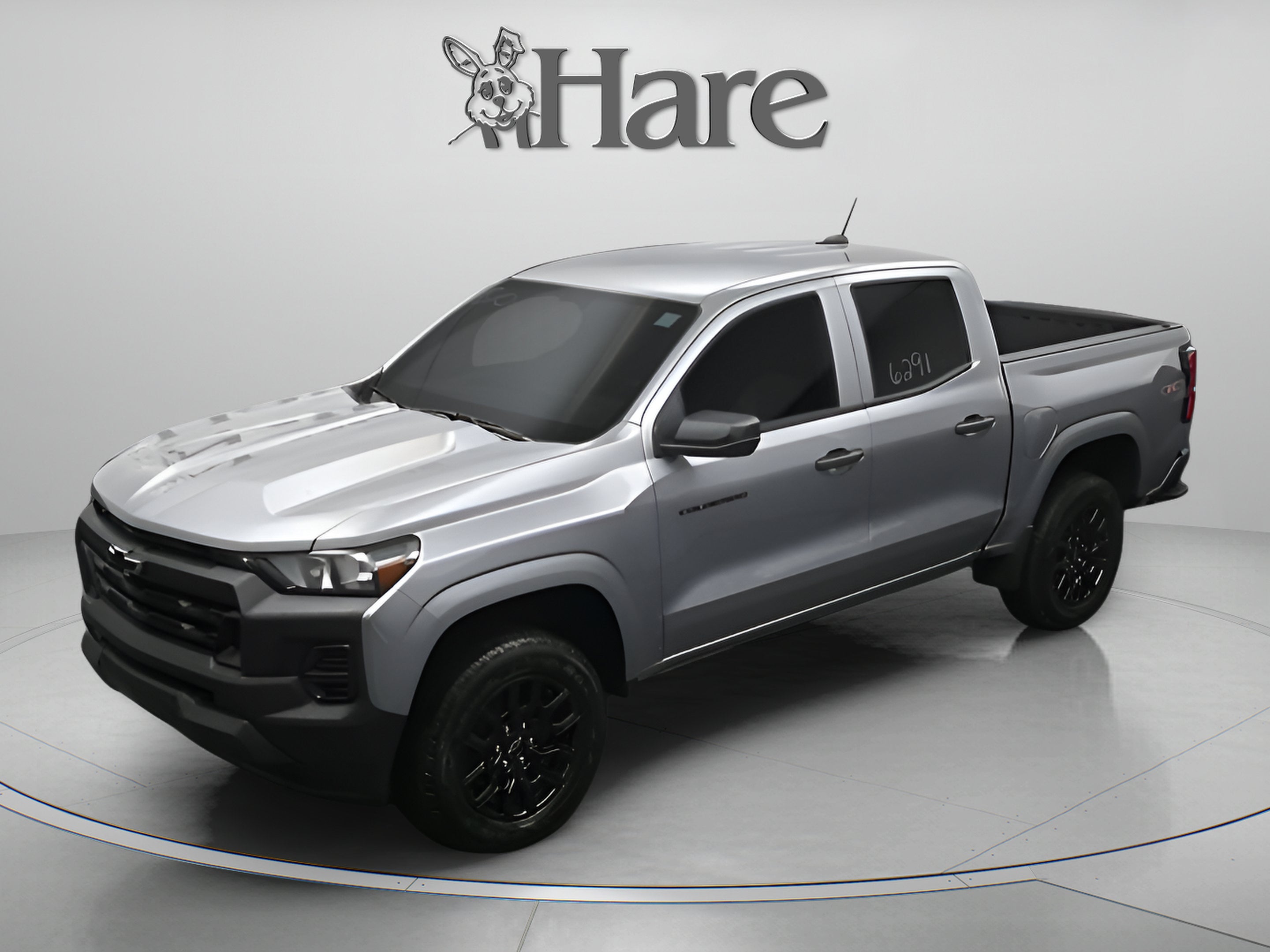2026 Chevrolet Colorado Work Truck in Sterling Gray Metallic — front three-quarter view